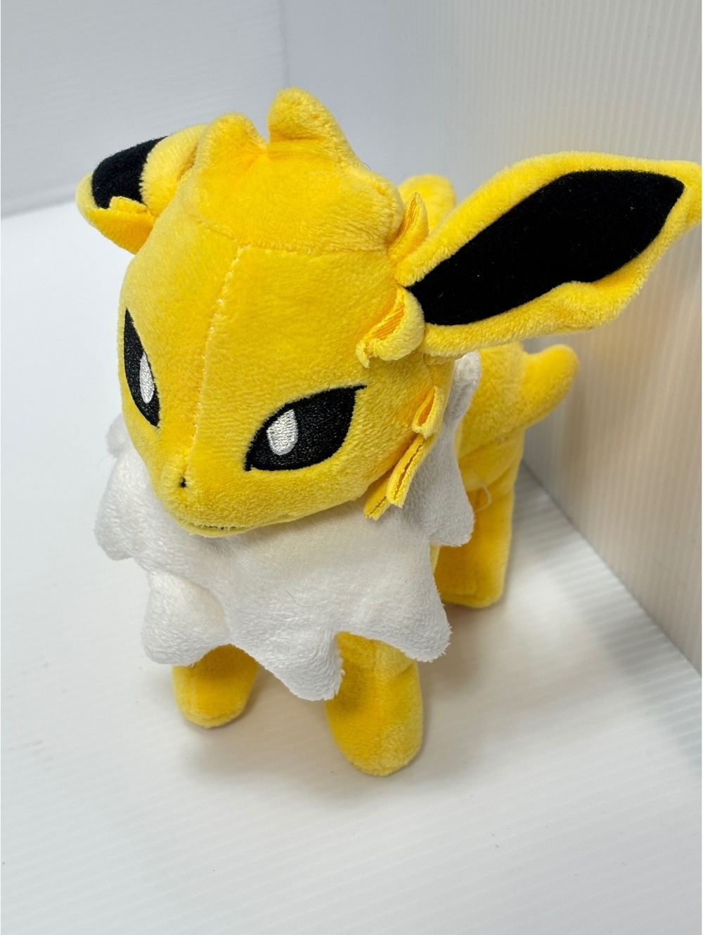 Jolteon Plush Toy - Soft Yellow and White Pokemon Stuffed Animal, Approx. 7.5"